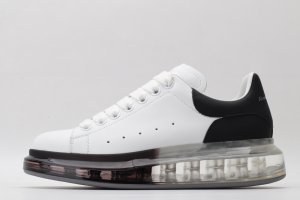 ALEXANDER MCQUEEN white oversized sneakers with black heel