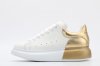 ALEXANDER MCQUEEN oversized sneakers with gold heel