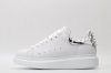 White calf leather lace-up sneaker with silver-finished hammered stud