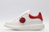 ALEXANDER MCQUEEN oversized sneakers with red heel