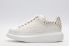 ALEXANDER MCQUEEN OVERSIZED SNEAKER with gold-finished hammered stud